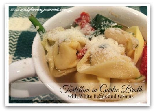 Tortellini in Garlic Broth with White Beans and Greens
