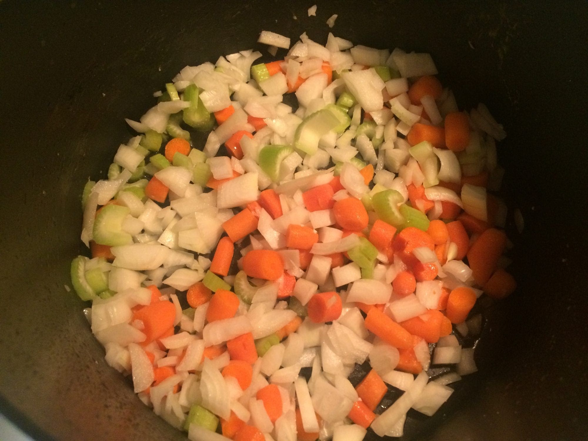 Cook vegetables for a chicken and dumpling soup on Meal Planning Mommies.