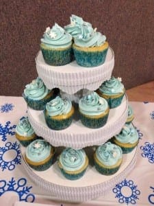 icey cupckes on stand