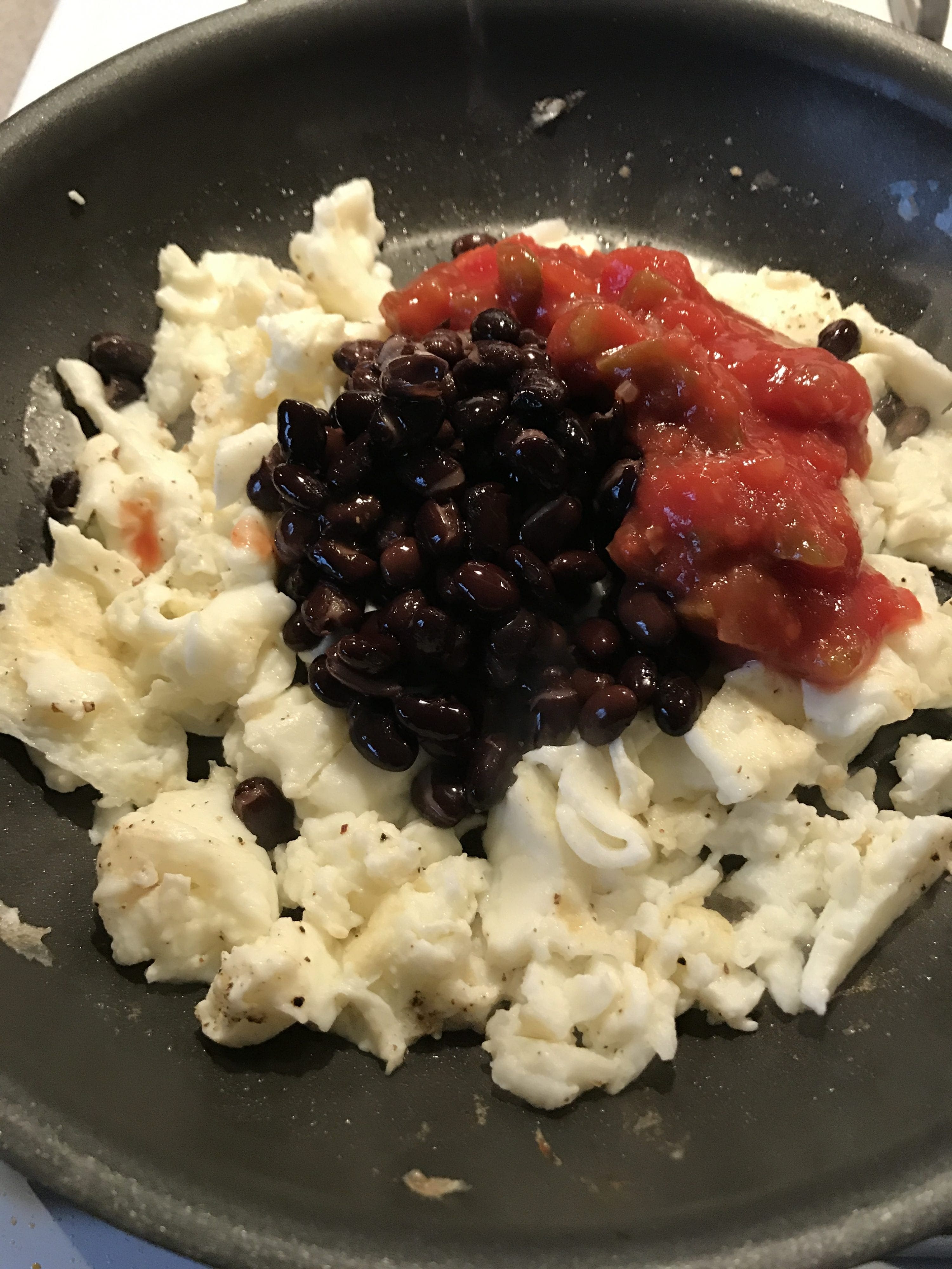Add beans and salsa to egg whites