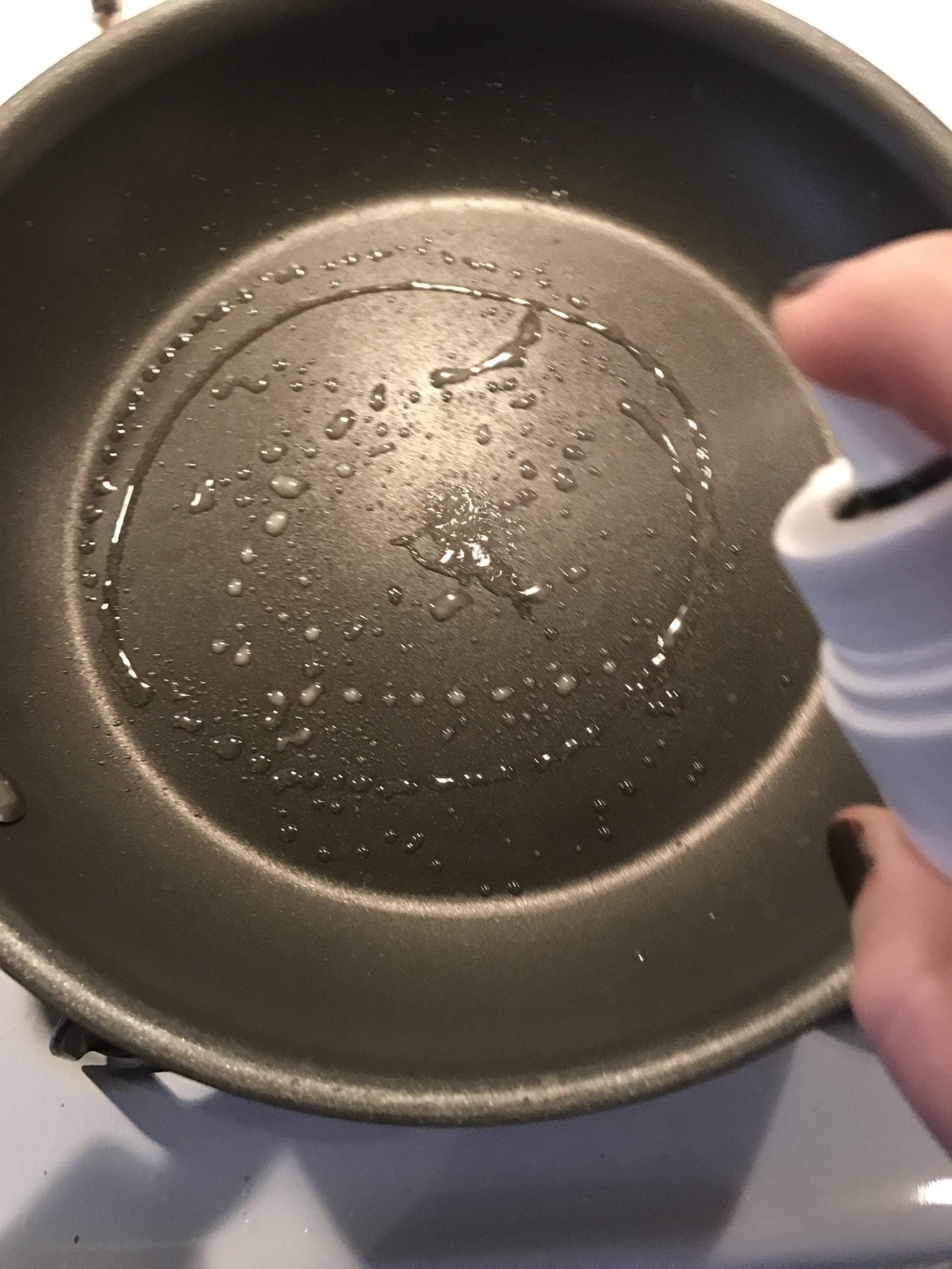 Spray pan with cooking spray