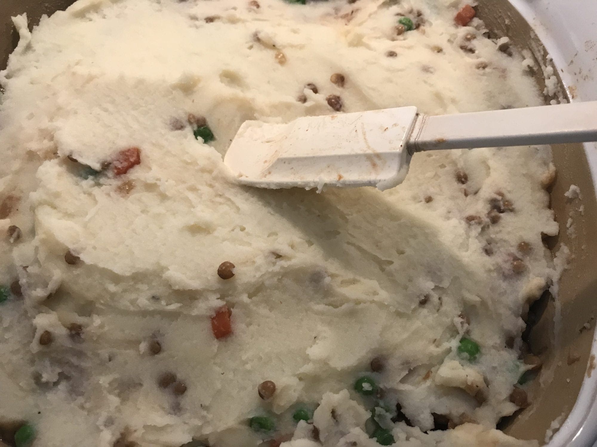 top lentil mixture with mashed potatoes