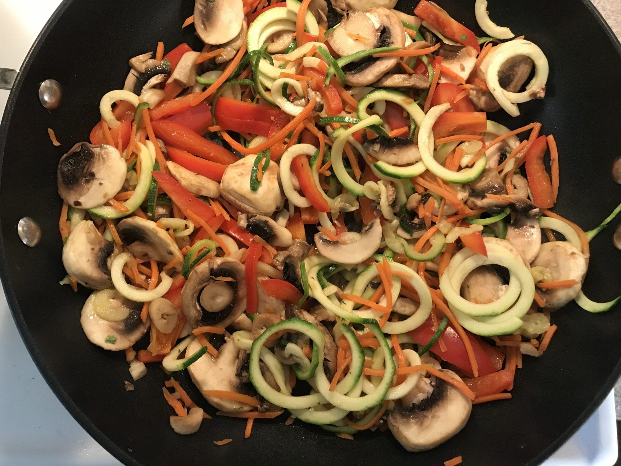 Cooking vegetables for a stir fry recipe.