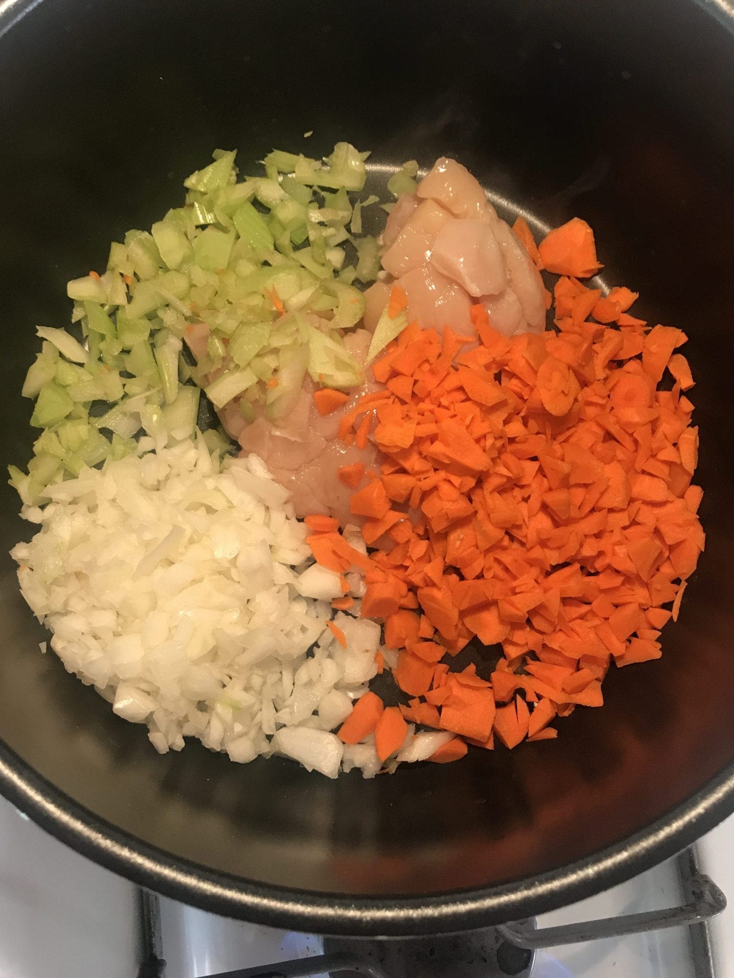 Cook the chicken, onion, celery, and carrots first.