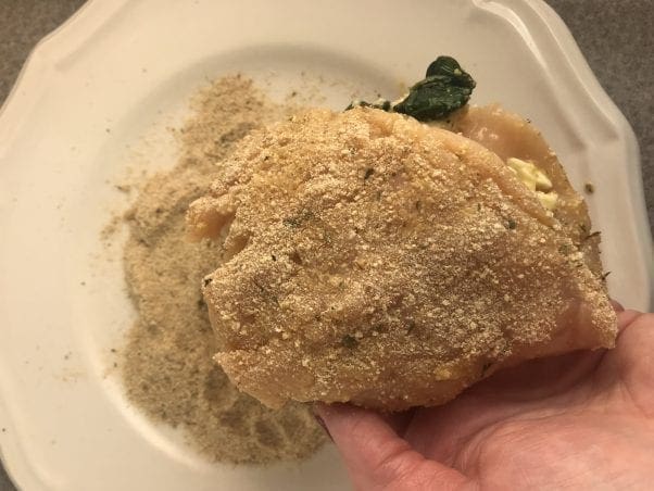 Coat chicken with breadcrumbs.
