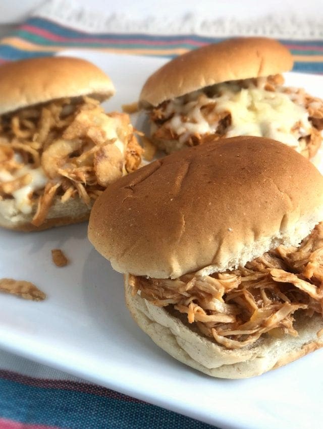 These super easy Slow Cooker Shredded BBQ chicken sandwiches are just 4 WW FreeStyle Smart Points per sandwich!