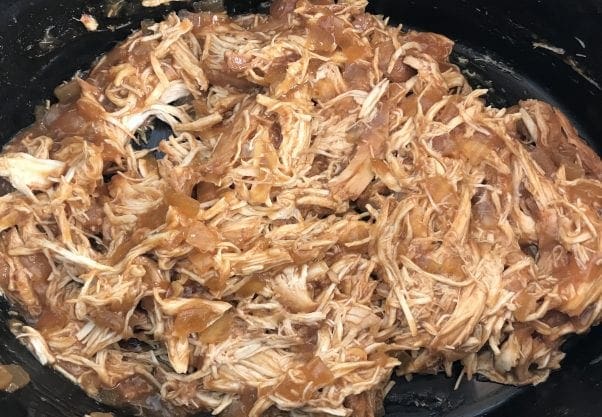 Add shredded chicken back in with the sauce.