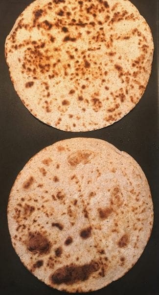 Spray tortillas with cooking spray and cook on the stove top until they are crispy.