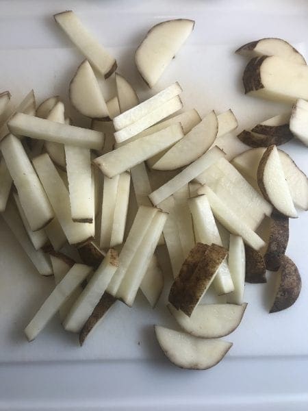 slice potatoes to make french fries.