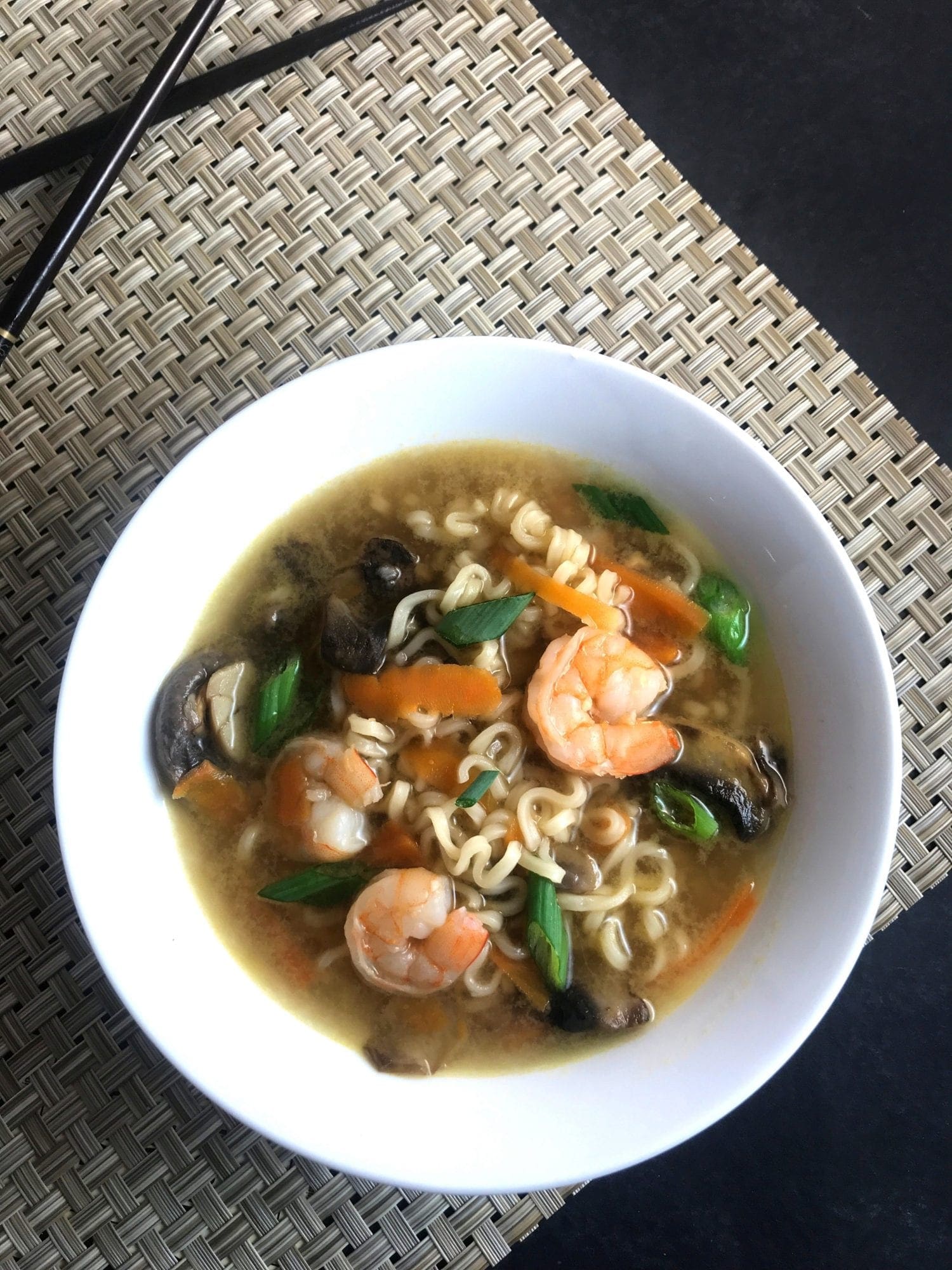 Shrimp, Ramen noodles, carrots, and mushrooms are cooked in a vegetable broth flavored with ginger and garlic in this simple Asian-style soup. Just 4 WW FreeStyle SmartPoints per serving.