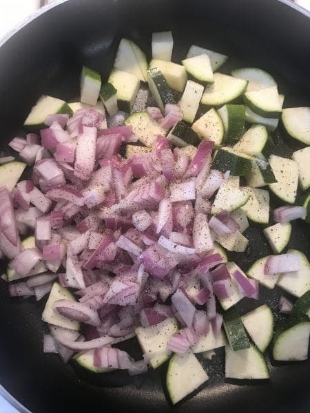 Saute the zucchini and red onion.