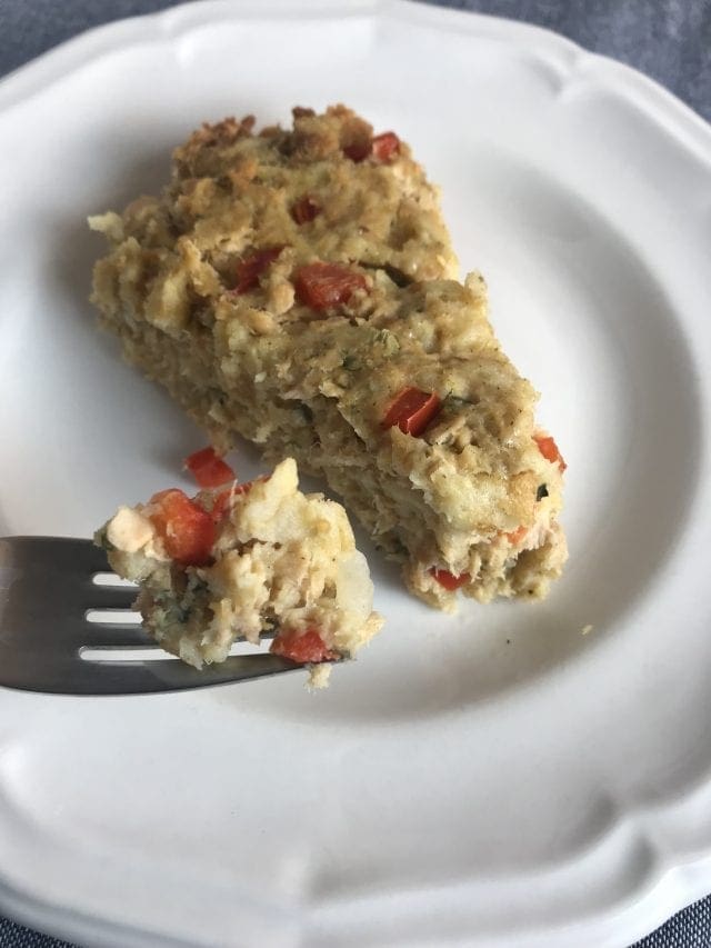 One slice of a salmon loaf cooked in a slow cooker.