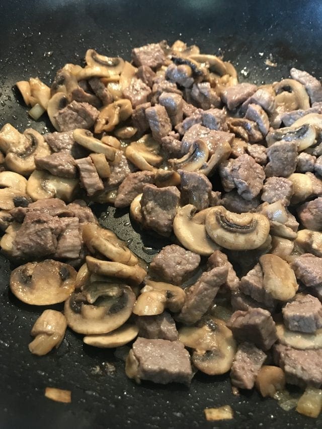 Saute mushrooms and shallots in the juice from the steak and add vinagrette ingredients for a flavorful way to top a Steak Mushroom and Blue Cheese salad.