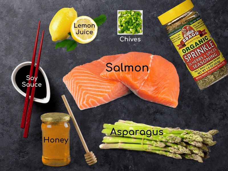 https://mealplanningmommies.com/wp-content/uploads/2020/04/Ingredients-for-Bragg-seasoned-Salmon-and-Asparagus.png